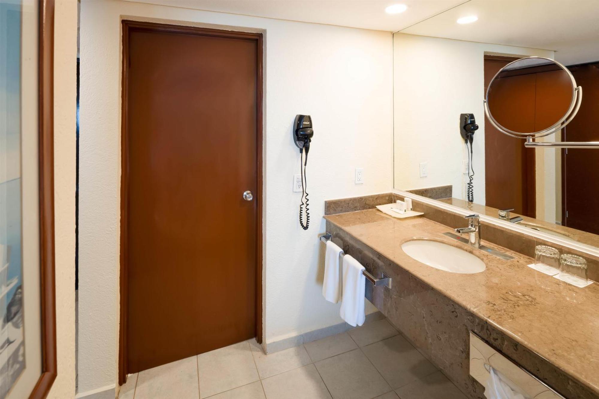 Accommodatie voor 2 Personen aan de Oceaan (2 Volwassenen + 2 Kinderen)